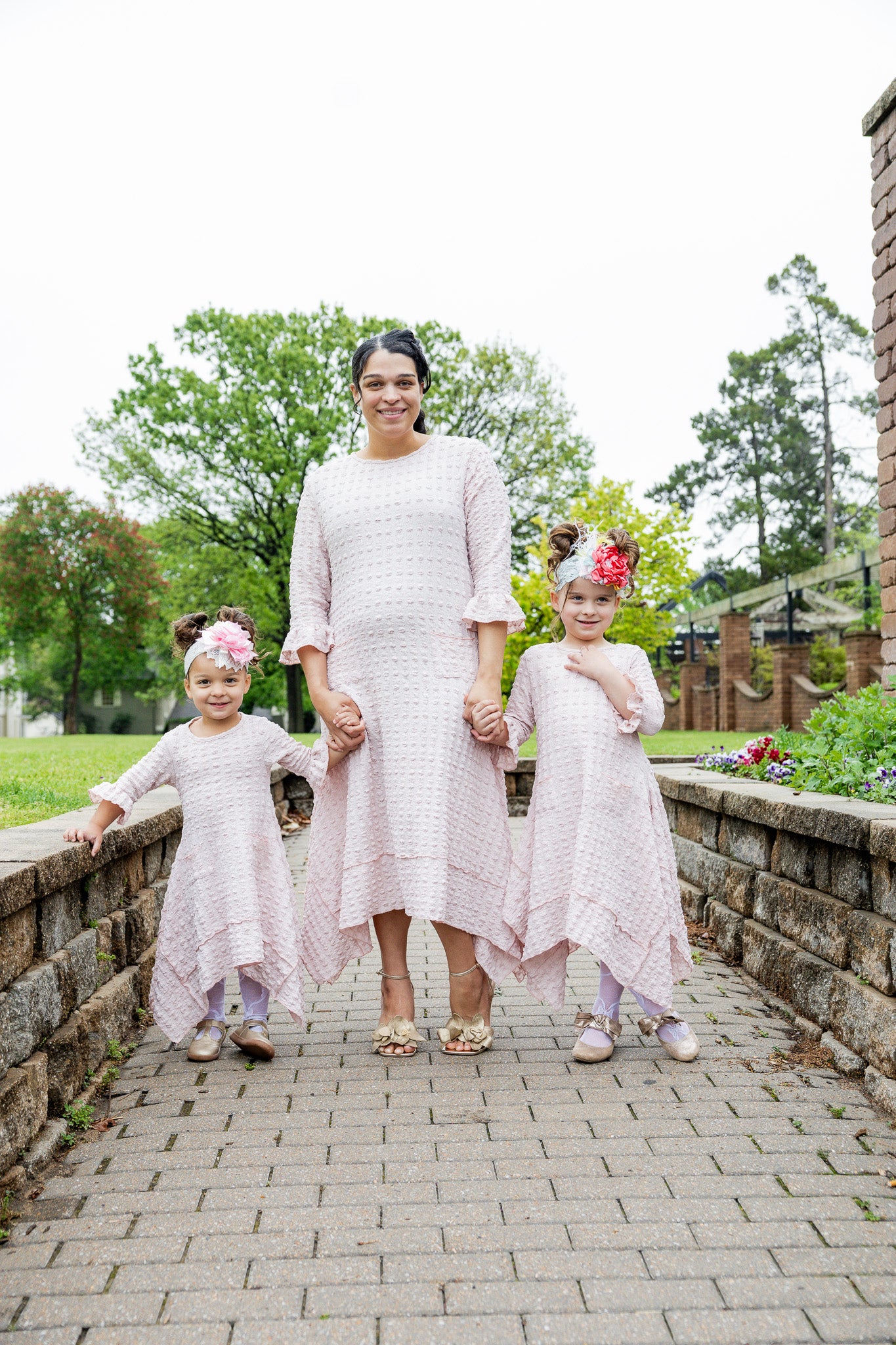 Mommy and Me matching dresses – Model in textured Daphne Dress.