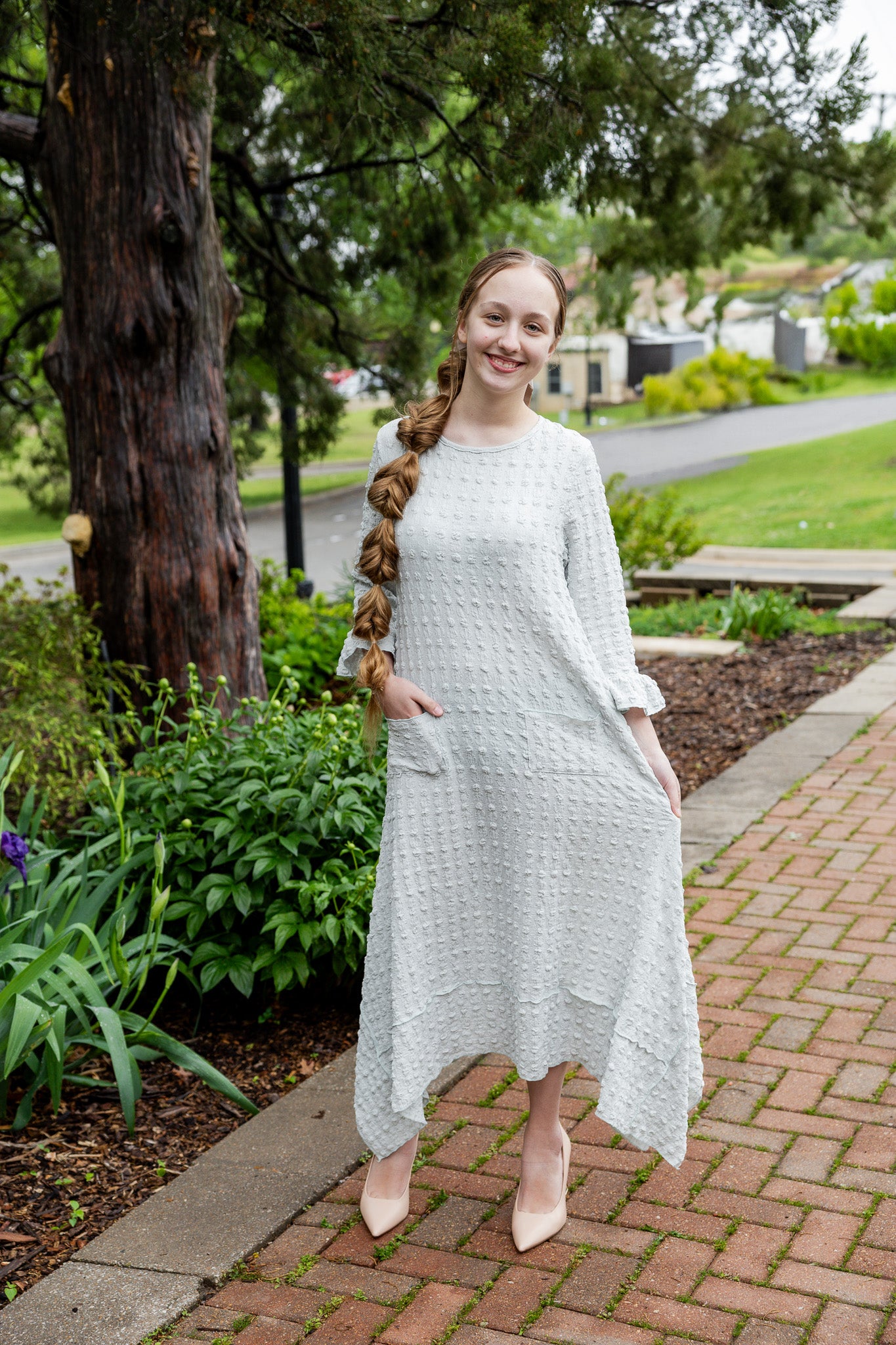 Mommy and Me matching dresses – Model in textured Daphne Dress.