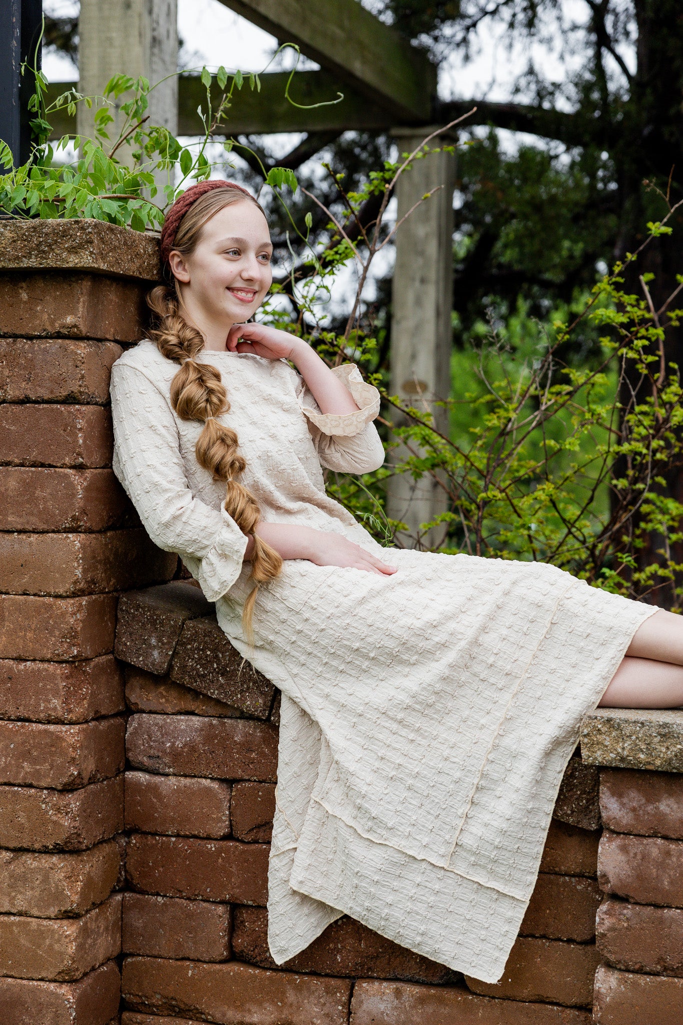Mommy and Me matching dresses – Model in textured Daphne Dress.