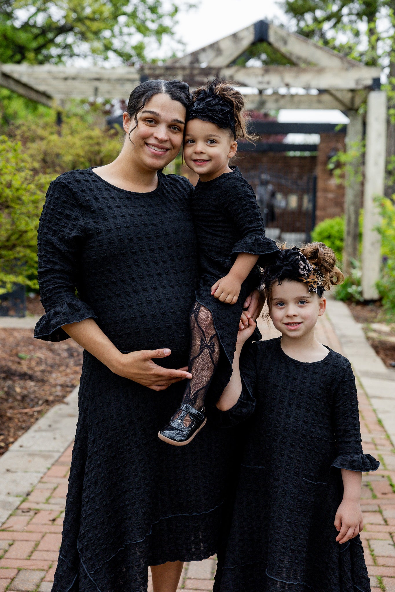Mommy and Me matching dresses – Model in textured Daphne Dress.