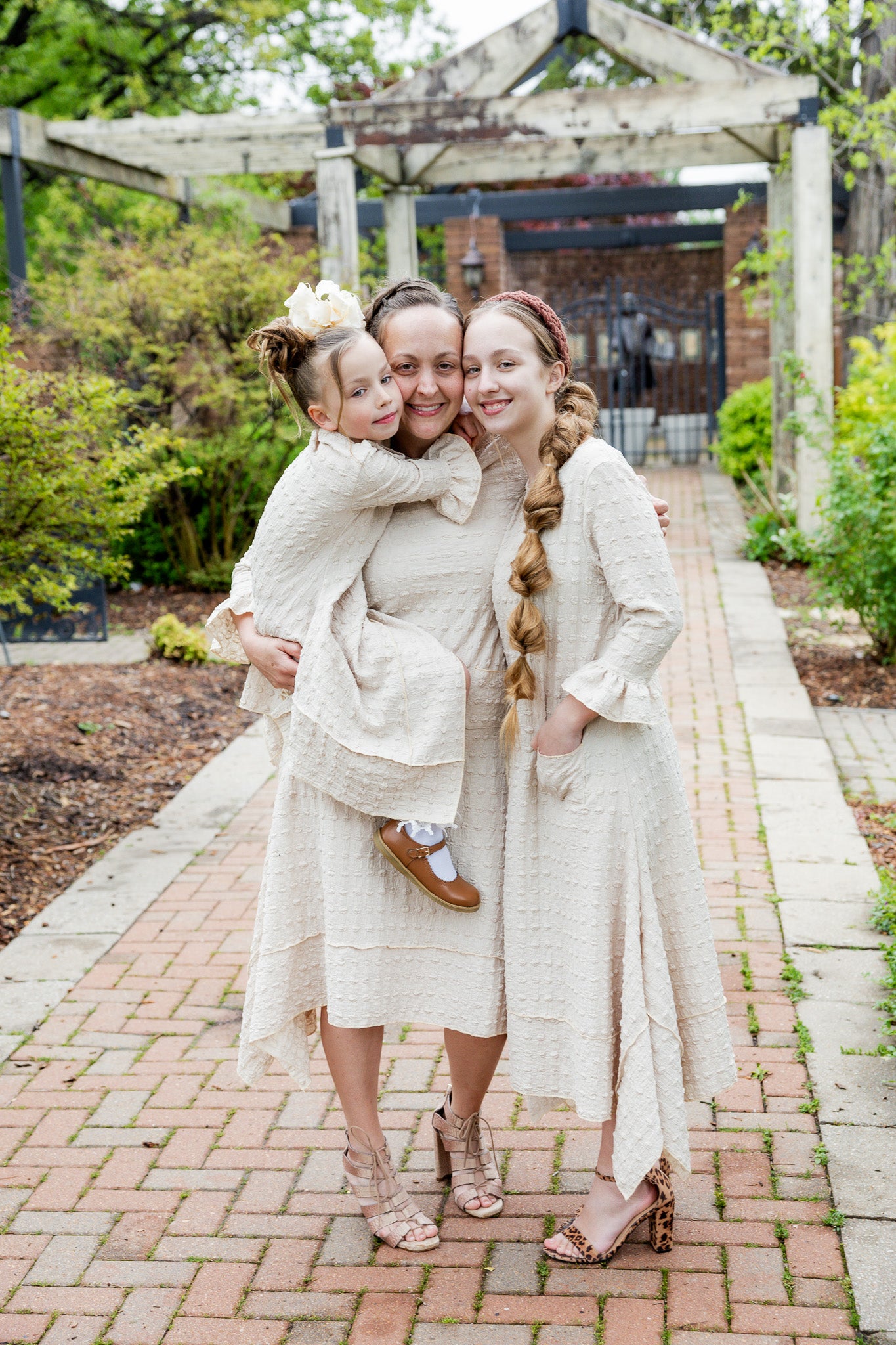 Mommy and Me matching dresses – Model in textured Daphne Dress.