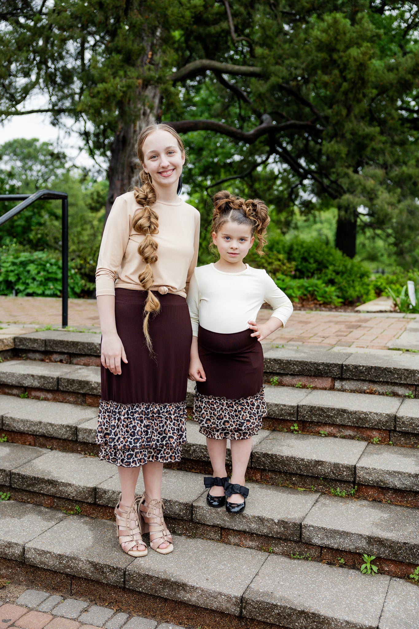 Modest girls’ ruffle slip with wide no-elastic waistband, perfect for layering under dresses and skirts.