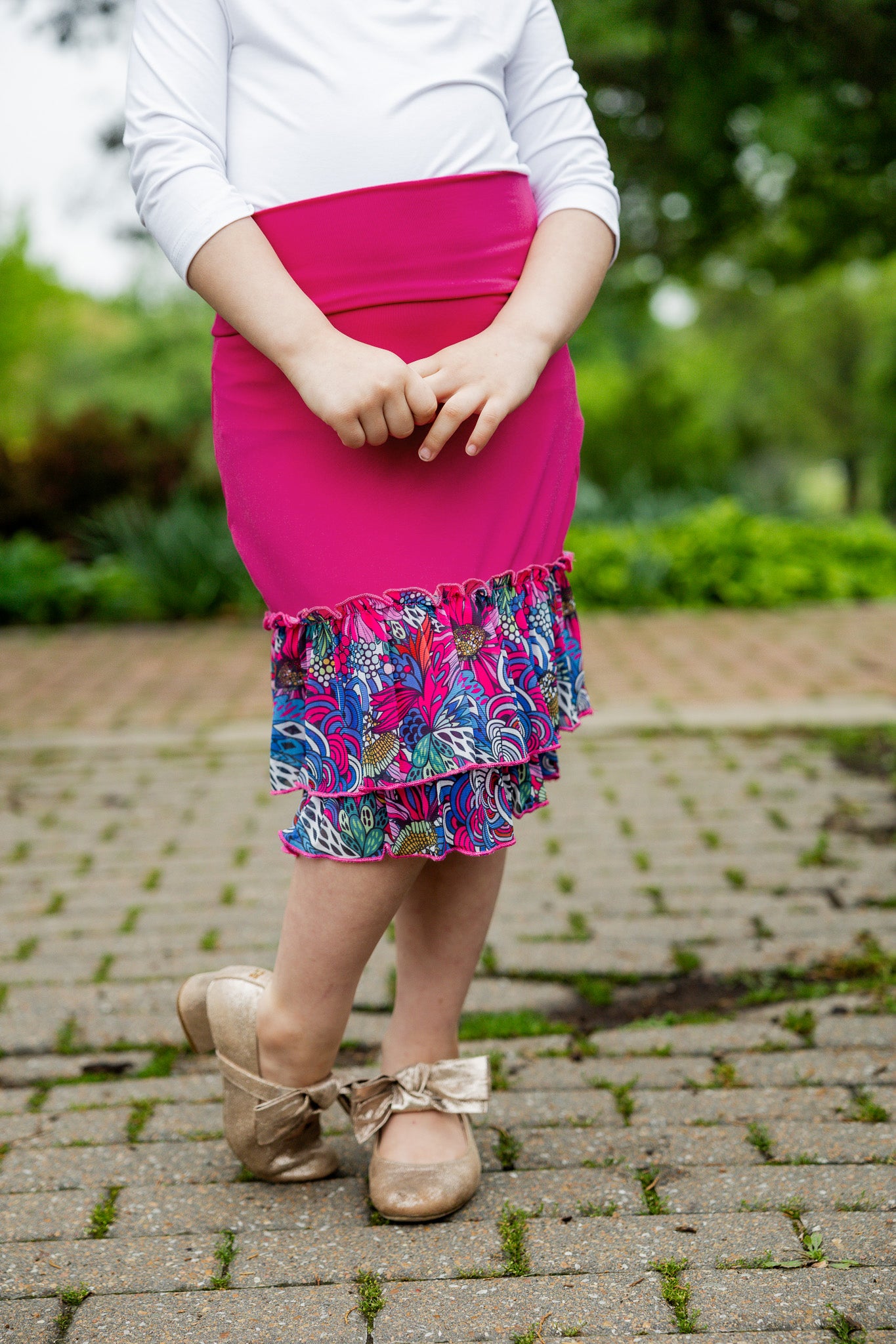 Modest girls’ ruffle slip with wide no-elastic waistband, perfect for layering under dresses and skirts.