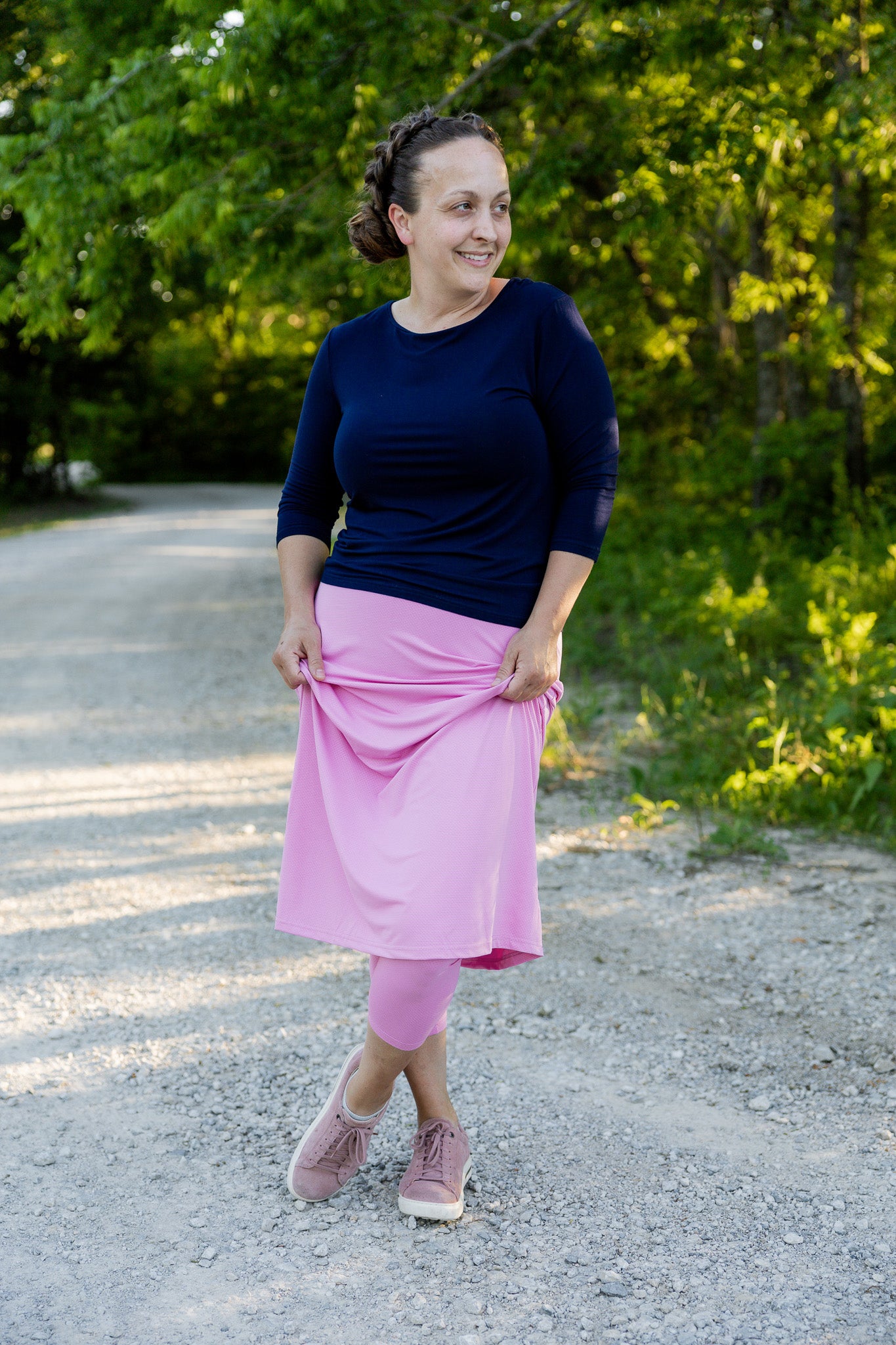 Modest activewear skirt with built-in leggings for women, breathable athletic fabric, paired with sneakers – perfect for workouts or casual wear.