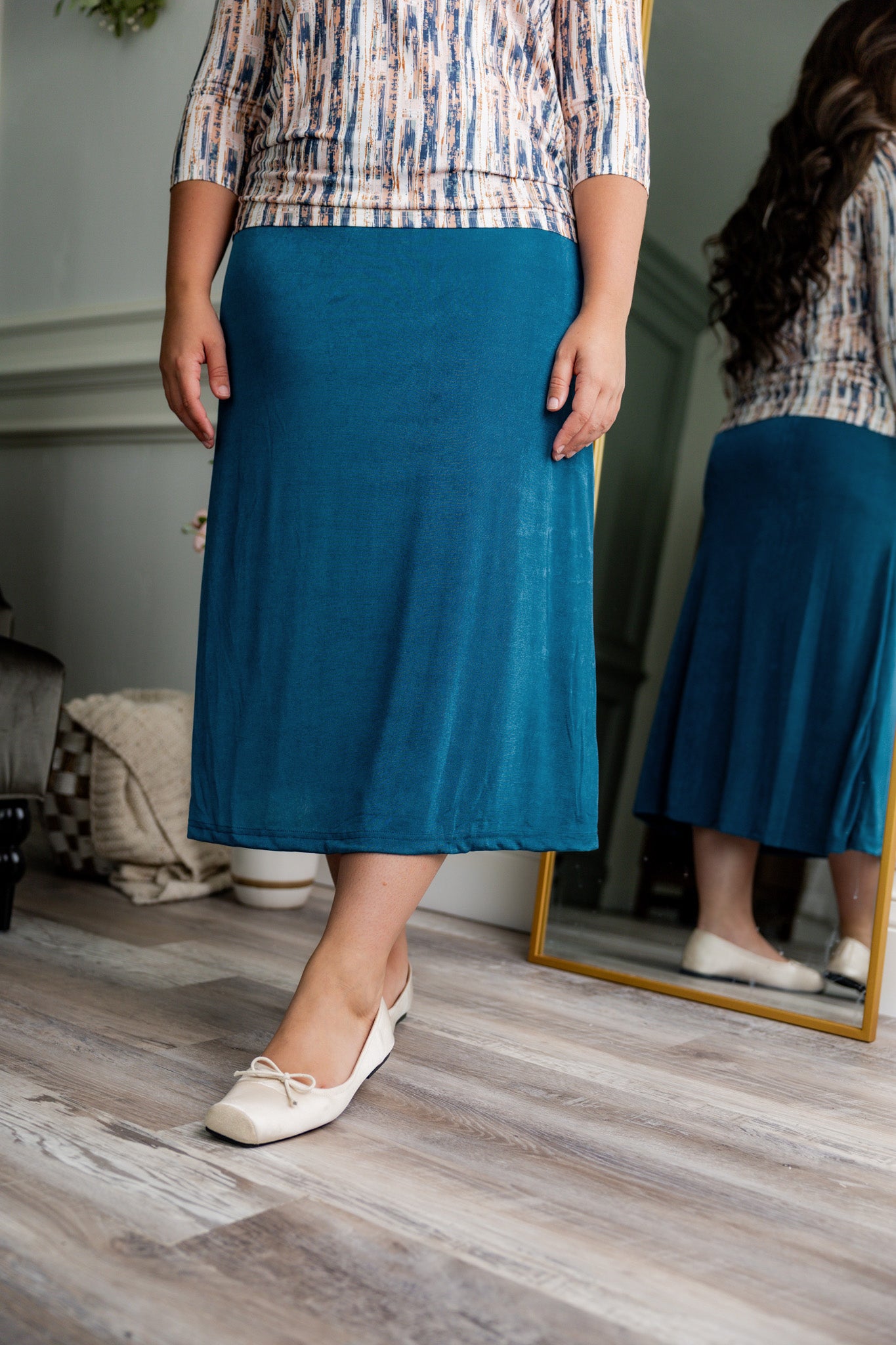 Nuggles® Renee Slinky Skirt – modest midi skirt in soft slinky stretch fabric, styled for everyday and dressy wear.