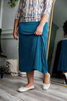 Nuggles® Renee Slinky Skirt – modest midi skirt in soft slinky stretch fabric, styled for everyday and dressy wear.