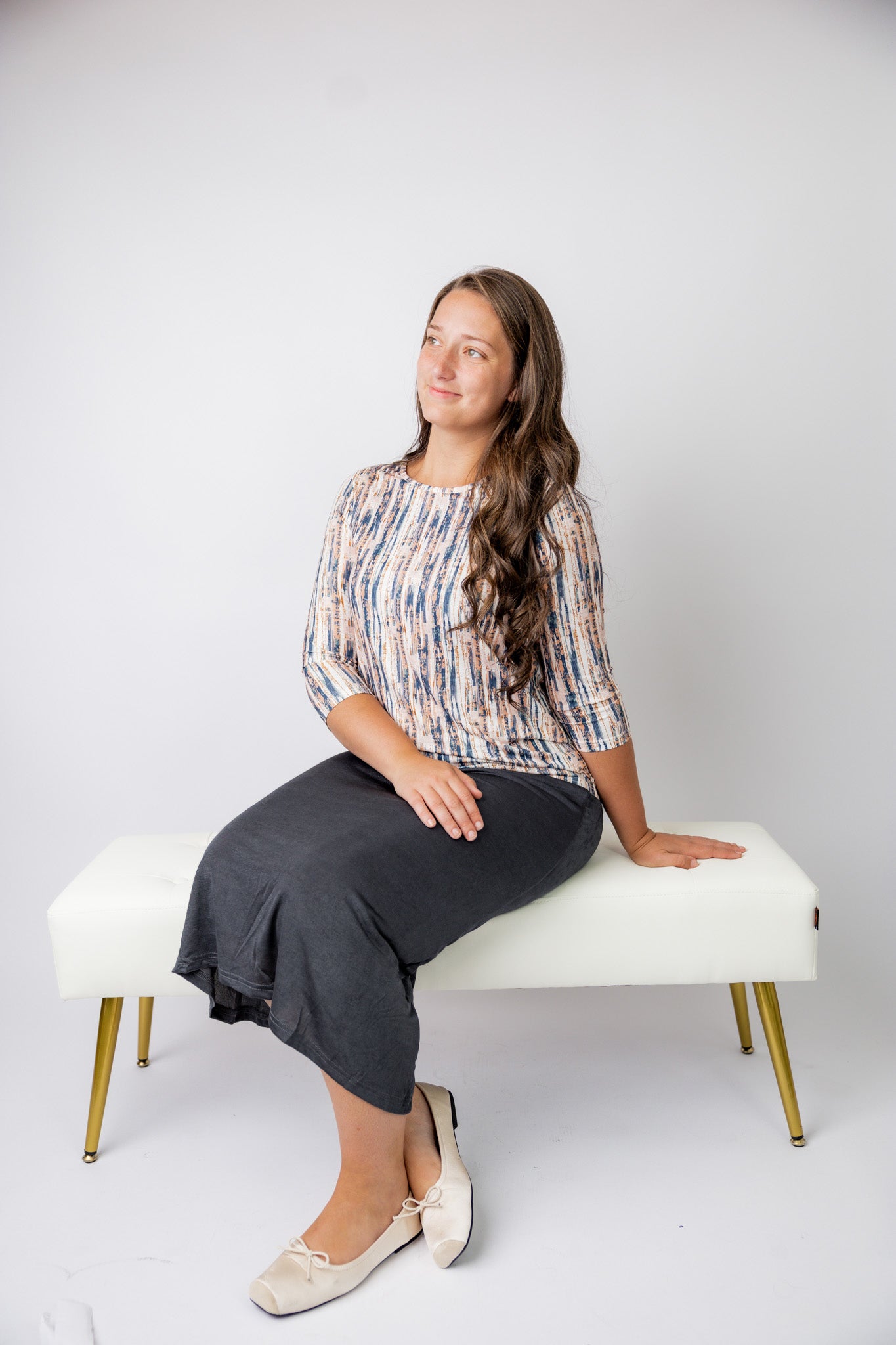 Nuggles® Renee Slinky Skirt – modest midi skirt in soft slinky stretch fabric, styled for everyday and dressy wear.