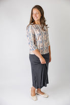 Nuggles® Renee Slinky Skirt – modest midi skirt in soft slinky stretch fabric, styled for everyday and dressy wear.