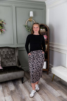 Model wearing Nuggles®31" Drawstring Skirt in Chic Leopard