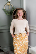 Model wearing Nuggles®3 1" Drawstring Skirt in Vanilla Sprinkle 