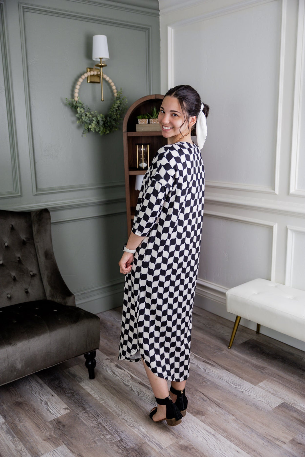 Model wearing Nuggles® Heather Dress in Wavy Checkerboard 