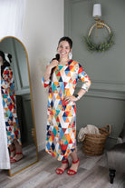 Model wearing Nuggles®  Heather Dress in Triangle Taffy