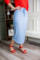 Model wearing Nuggles®31" Drawstring Skirt in Sky Gingham