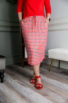 Model wearing Nuggles® 27" Drawstring Skirt in Cherry Jam
