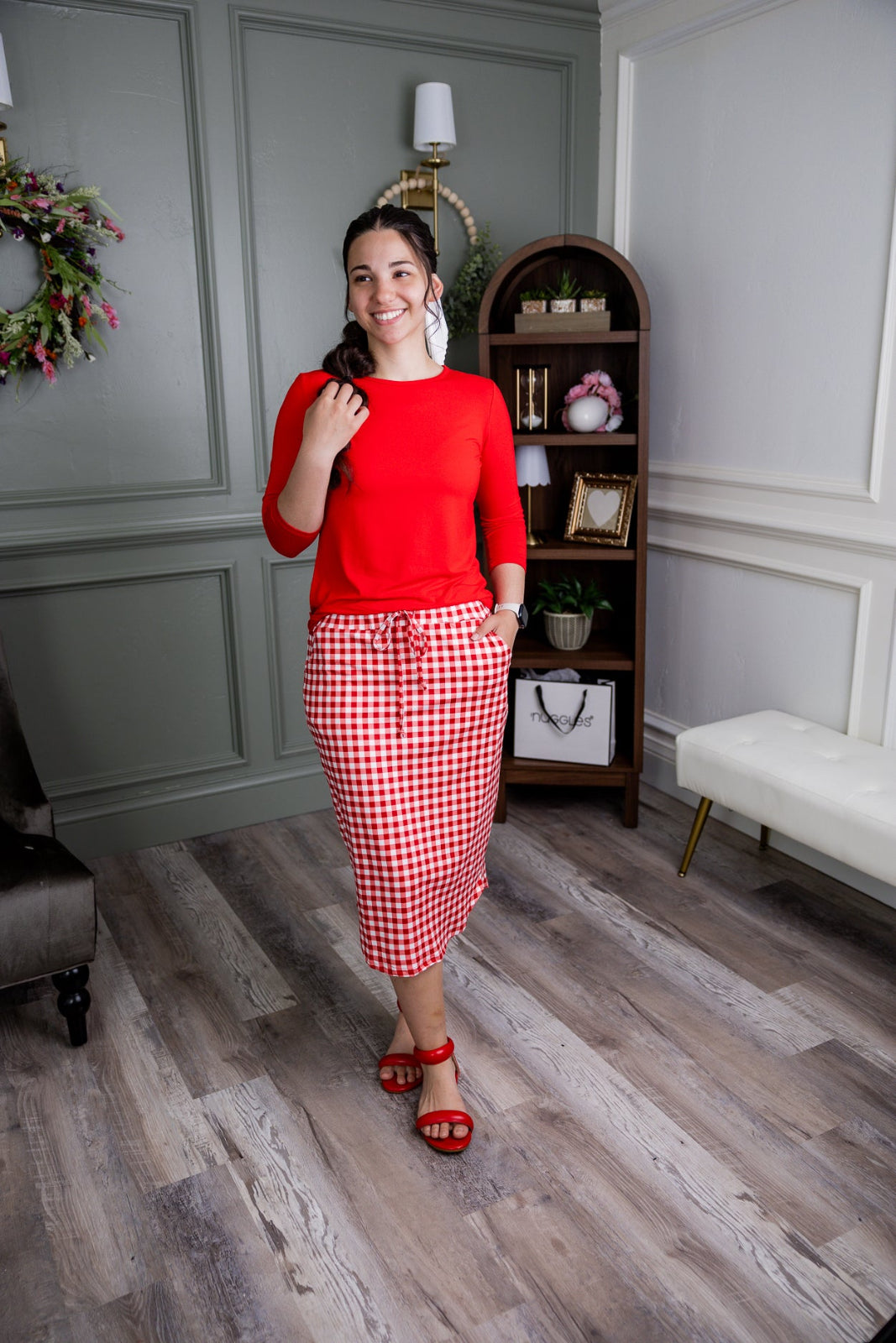 Model wearing Nuggles® 27" Drawstring Skirt in Cherry Jam
