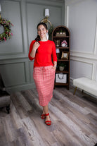 Model wearing Nuggles® 27" Drawstring Skirt in Cherry Jam