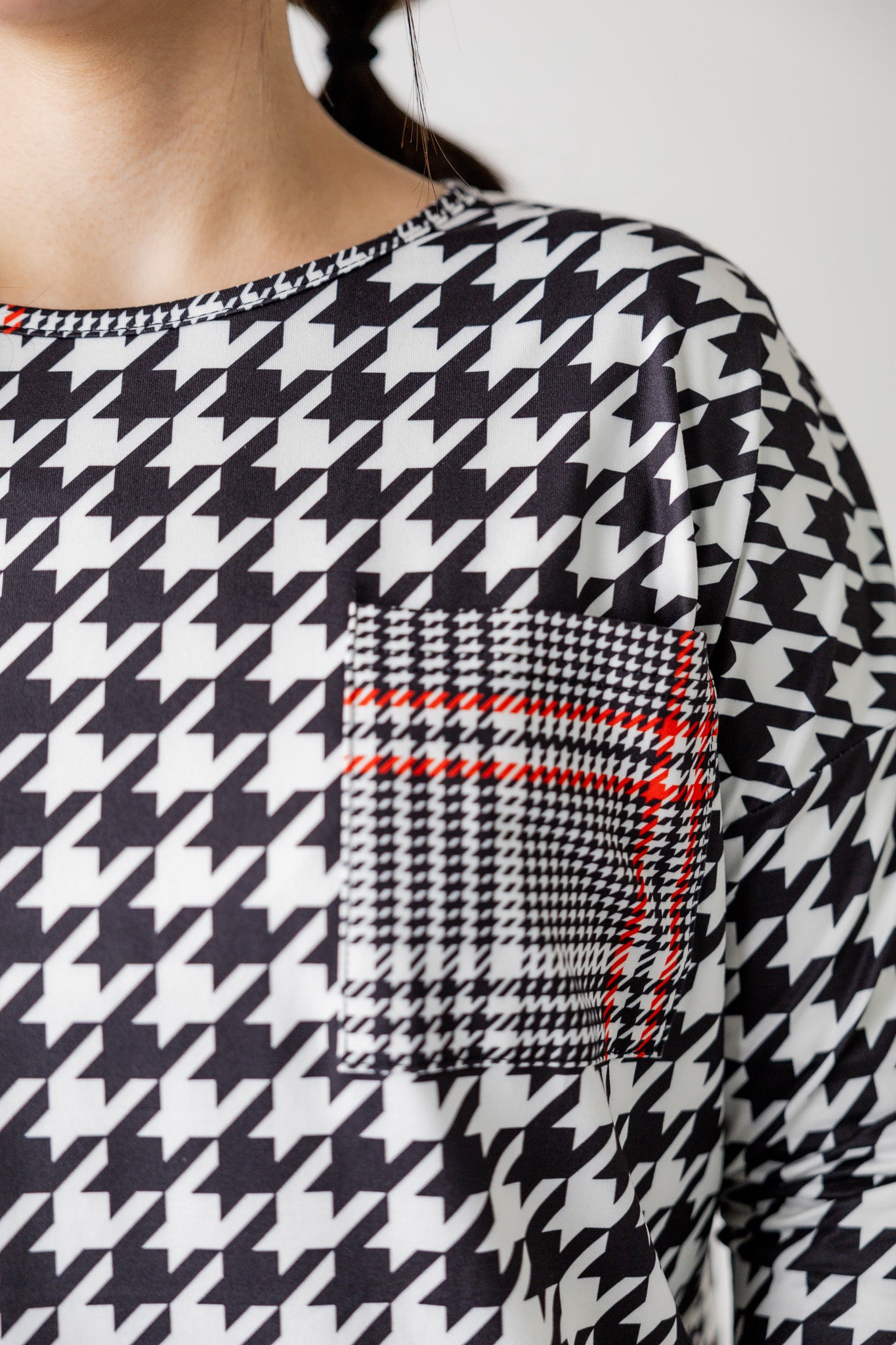 Modest women's Paisley Top with 3/4 sleeves, front pocket, and contrast knit fabrics, styled with a classic skirt – perfect for everyday wear or church outfits