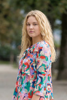 Jelly Pop Eleanor Top, Nuggles plus-size-friendly modest top in fun pink print with bow neckline detail