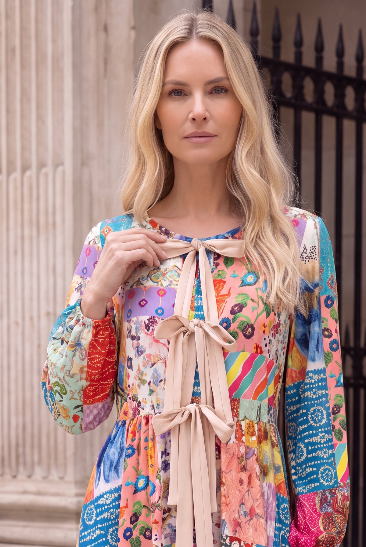 Model wearing Nuggles®  Addison Dress in Keepsake Quilt