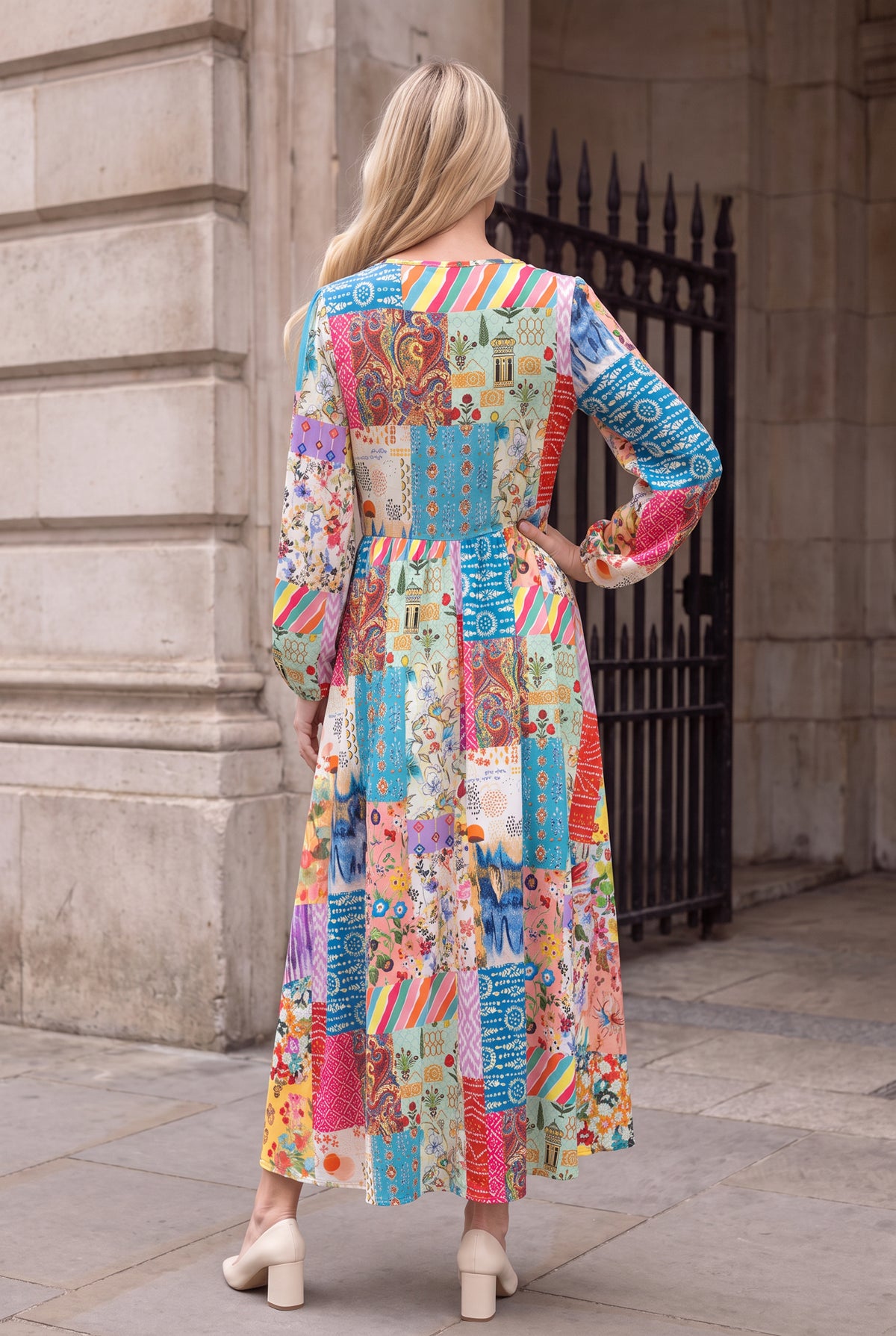 Model wearing Nuggles®  Addison Dress in Keepsake Quilt