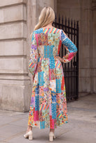 Model wearing Nuggles®  Addison Dress in Keepsake Quilt