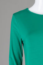 Model wearing Nuggles® Midi Layering Dress in Kelly Green