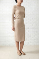 Model wearing Nuggles® 25" Relaxed Midi Skirt in Khaki