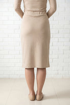 Model wearing Nuggles® 25" Relaxed Midi Skirt in Khaki