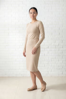 Model wearing Nuggles® 25" Relaxed Midi Skirt in Khaki