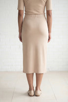 Model wearing Nuggles® 31" Relaxed Midi Skirt in Khaki