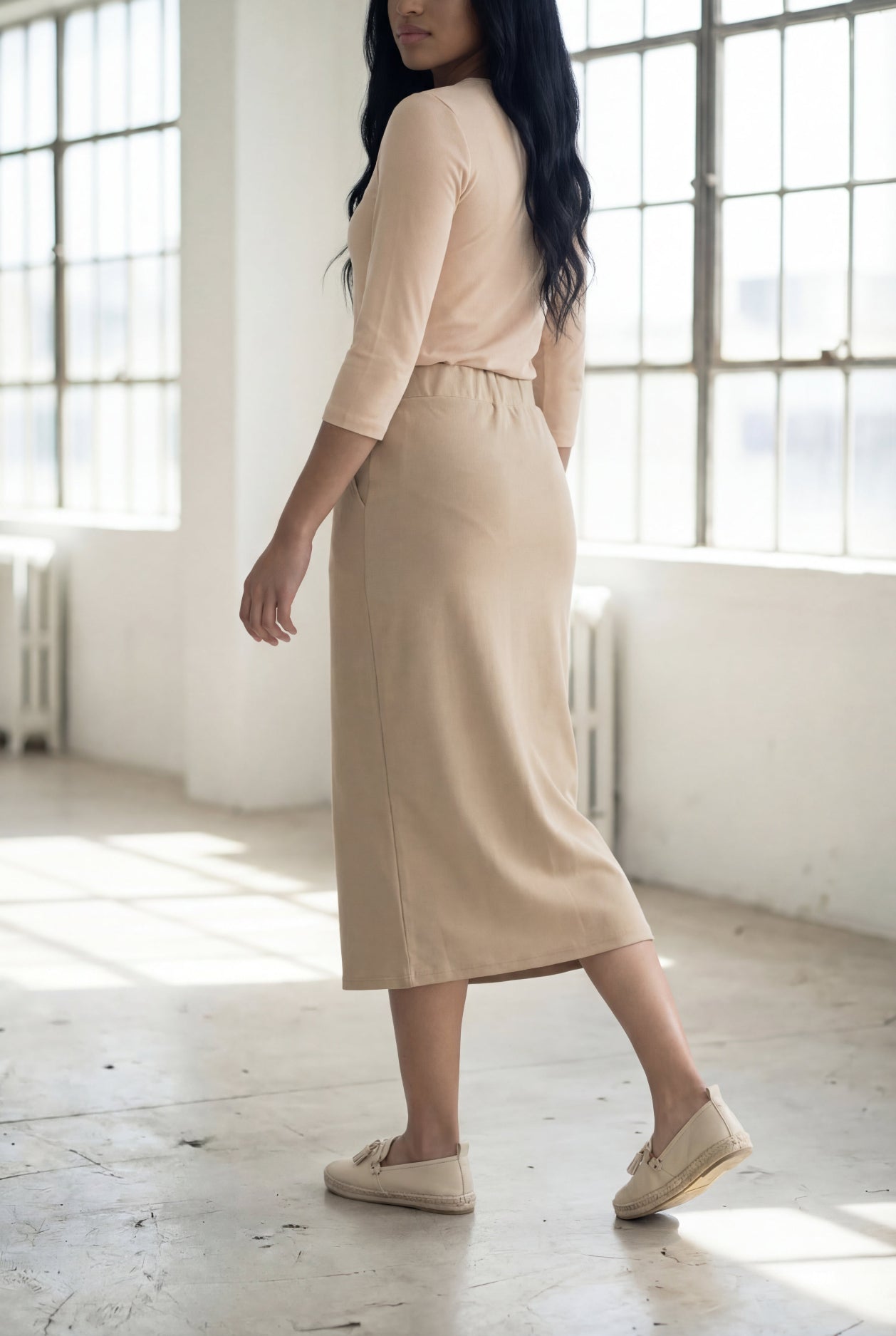 Model wearing Nuggles® 31" Pocket Classic Skirt in Khaki