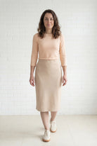 Model wearing Nuggles® 27" Relaxed Midi Skirt in Khaki
