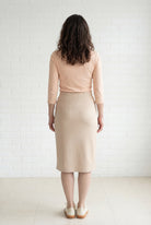 Model wearing Nuggles® 27" Relaxed Midi Skirt in Khaki