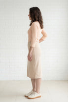 Model wearing Nuggles® 27" Relaxed Midi Skirt in Khaki