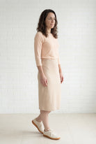 Model wearing Nuggles® 27" Relaxed Midi Skirt in Khaki