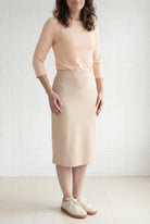 Model wearing Nuggles® 27" Relaxed Midi Skirt in Khaki