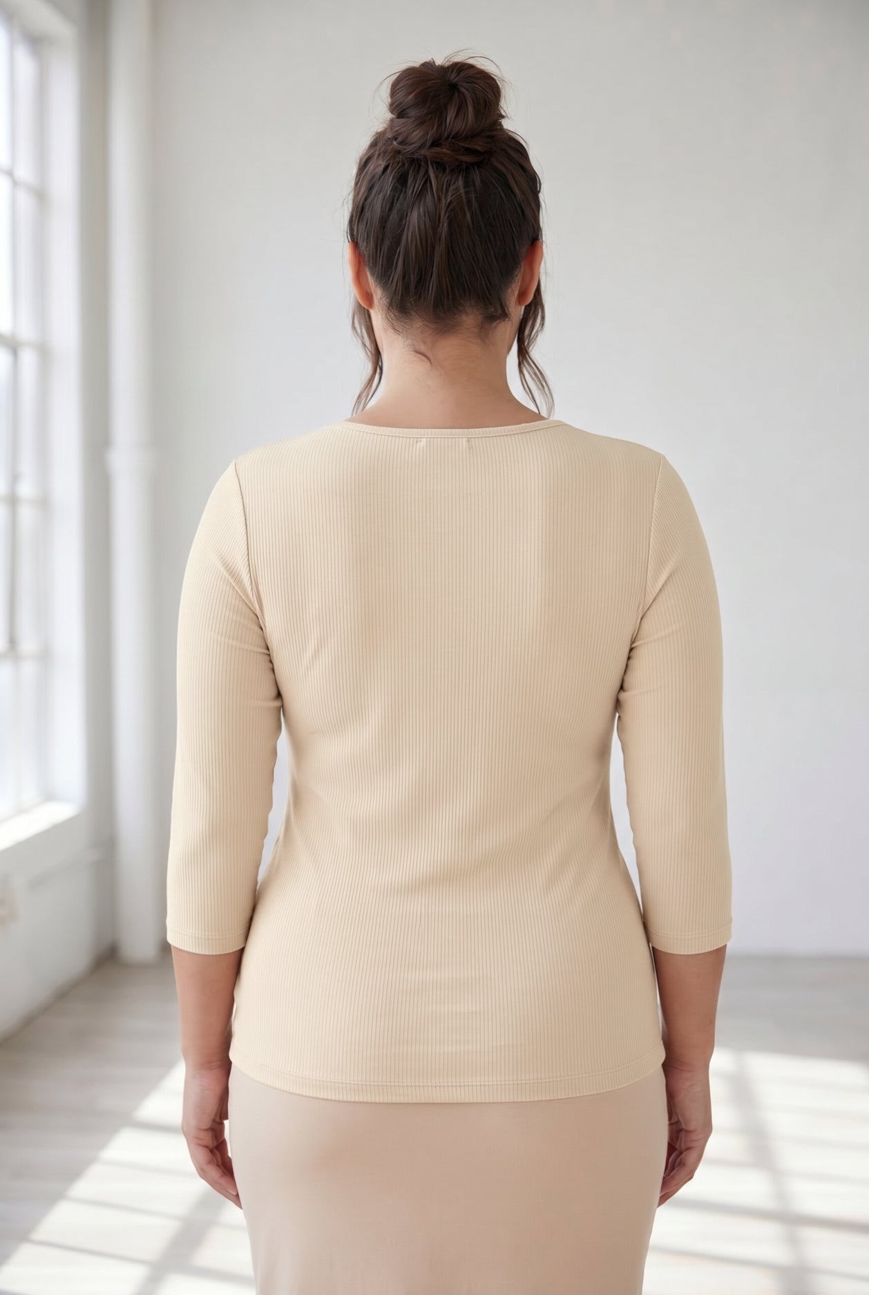 Model wearing Nuggles® 3/4 Essential Ribbed Tee in Khaki