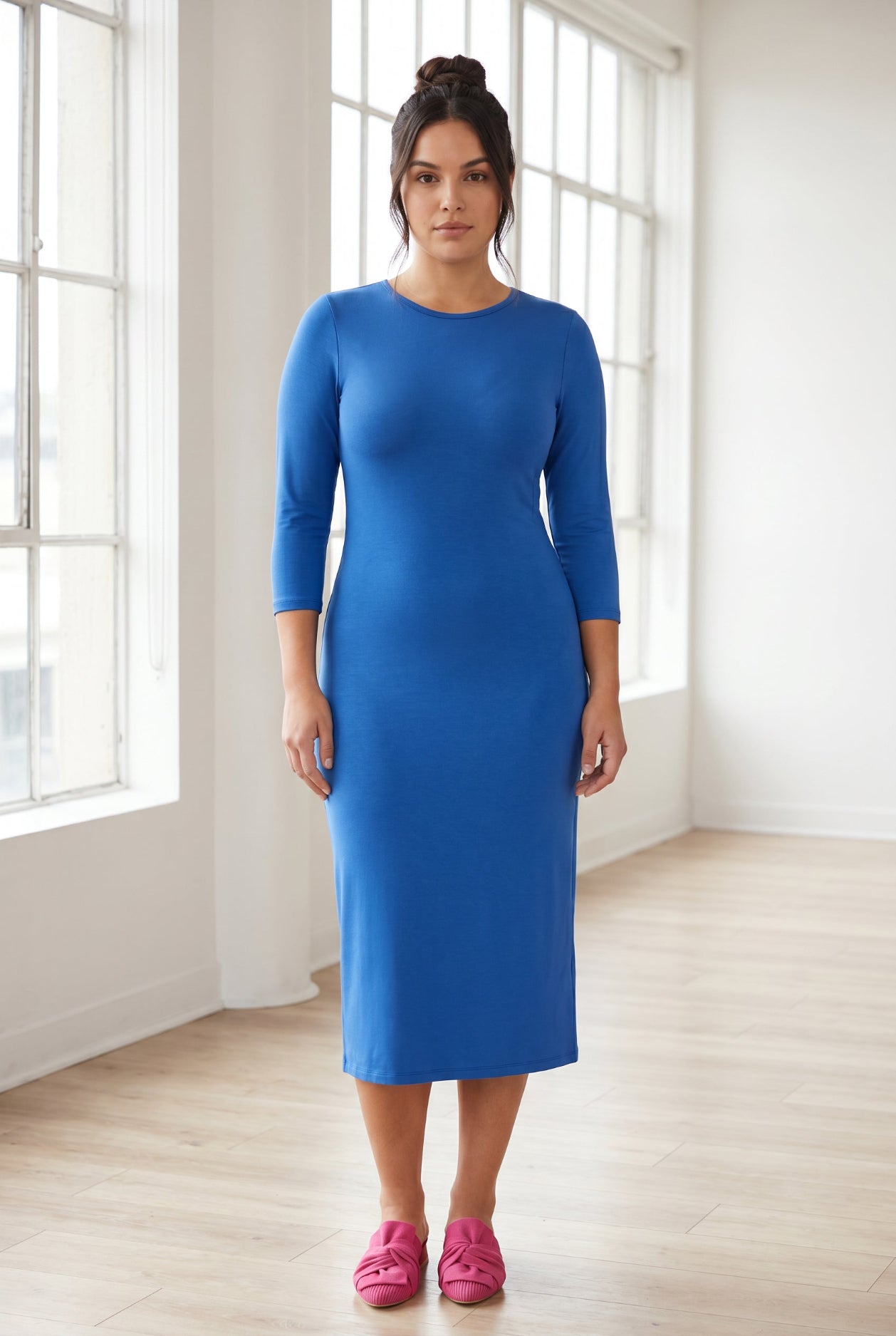 Model wearing Nuggles® Midi Layering Dress in Lapiz Blue
