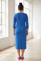 Model wearing Nuggles® Midi Layering Dress in Lapiz Blue