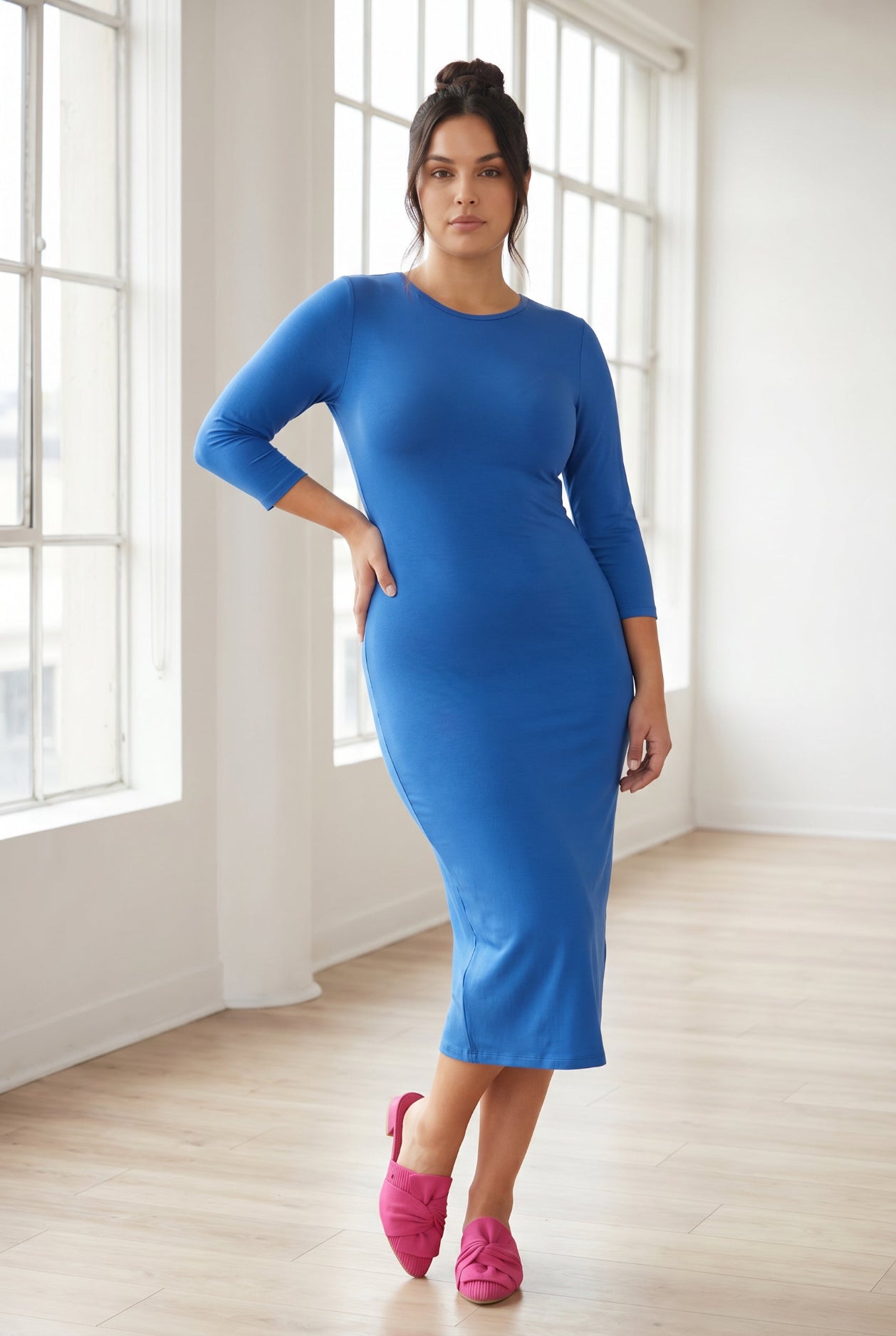 Model wearing Nuggles® Midi Layering Dress in Lapiz Blue