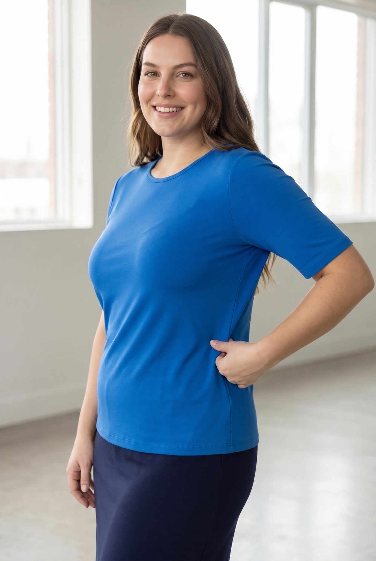 Model wearing the Nuggles® Essential Half Sleeve Tee in Lapiz Blue