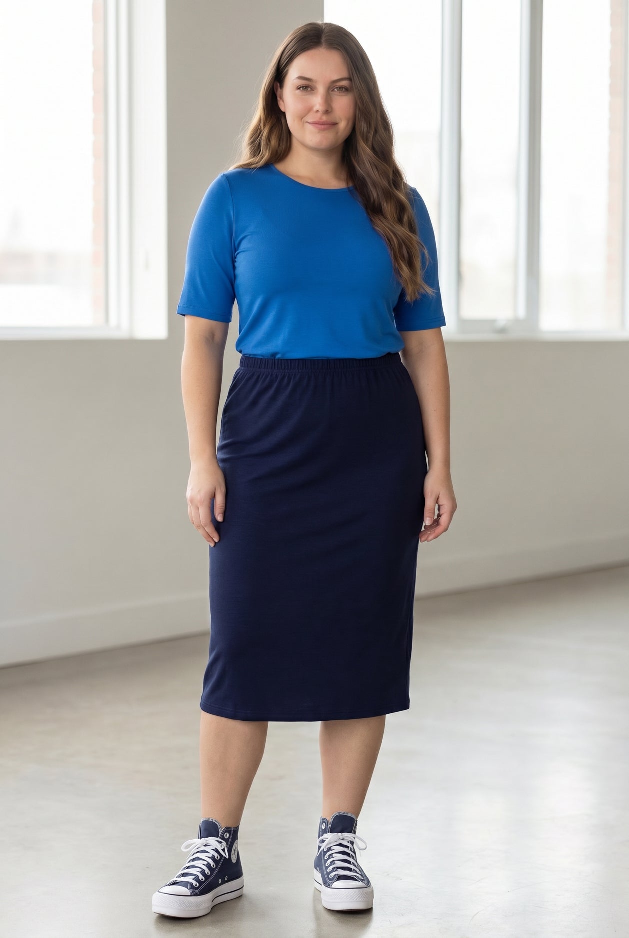 Model wearing the Nuggles® Essential Half Sleeve Tee in Lapiz Blue
