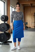 Model wearing Nuggles® 27" All-Sport Skirt in Lapiz Blue