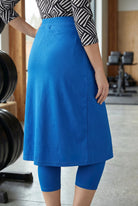 Model wearing Nuggles® 27" All-Sport Skirt in Lapiz Blue