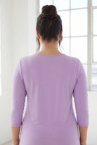 Model wearing Nuggles® 3/4 Essential Tee in Lavender