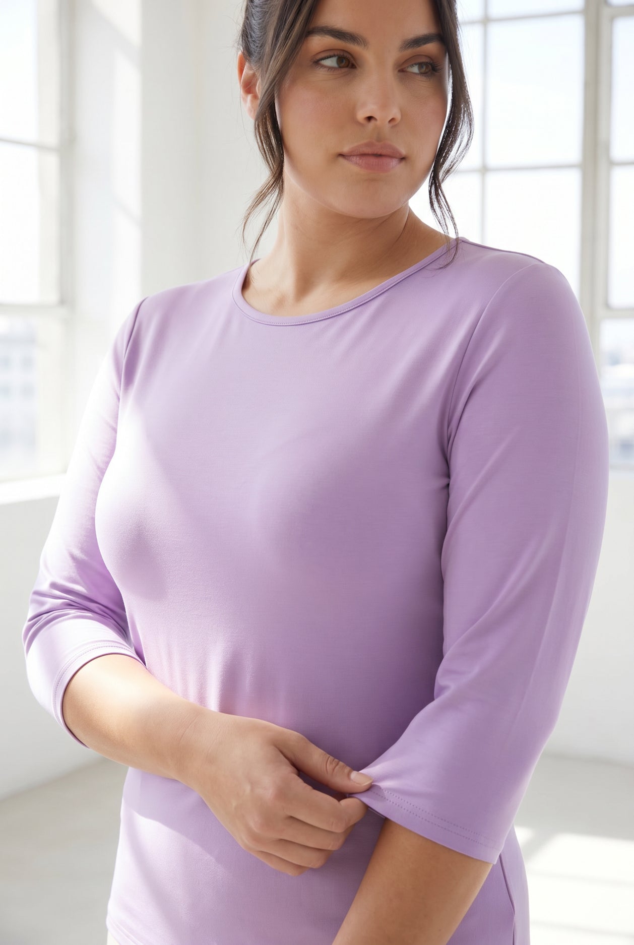 Model wearing Nuggles® 3/4 Essential Tee in Lavender