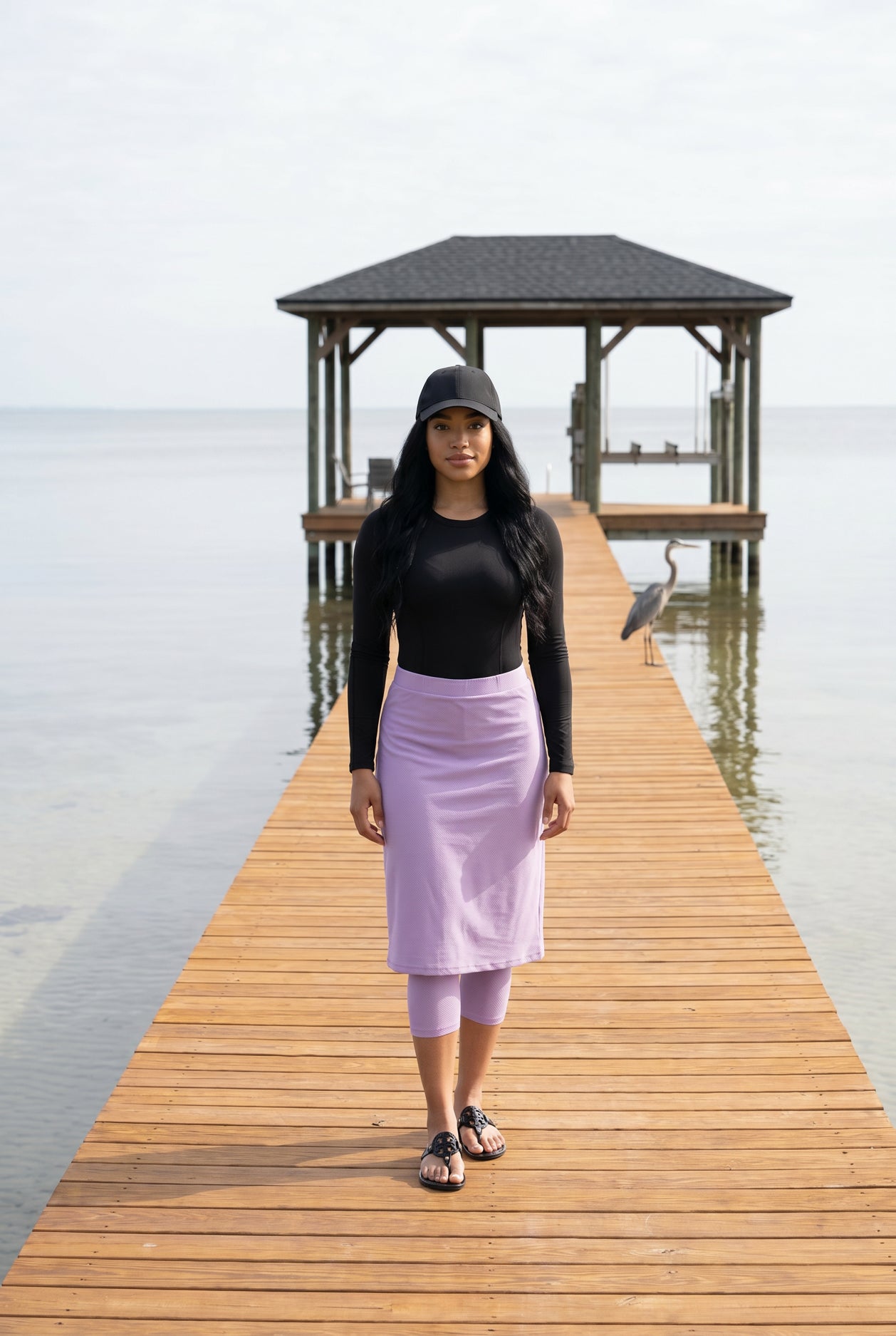 Model wearing Nuggles®  27"All-Sport Skirt  in Lavender