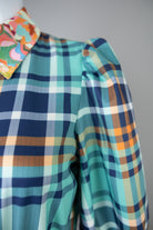 Model wearing Nuggles®  Leila Dress in Highland Plaid
