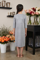 Model wearing Nuggles® Girls Midi Layering Dress in Light Heather 