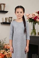 Model wearing Nuggles® Girls Midi Layering Dress in Light Heather 